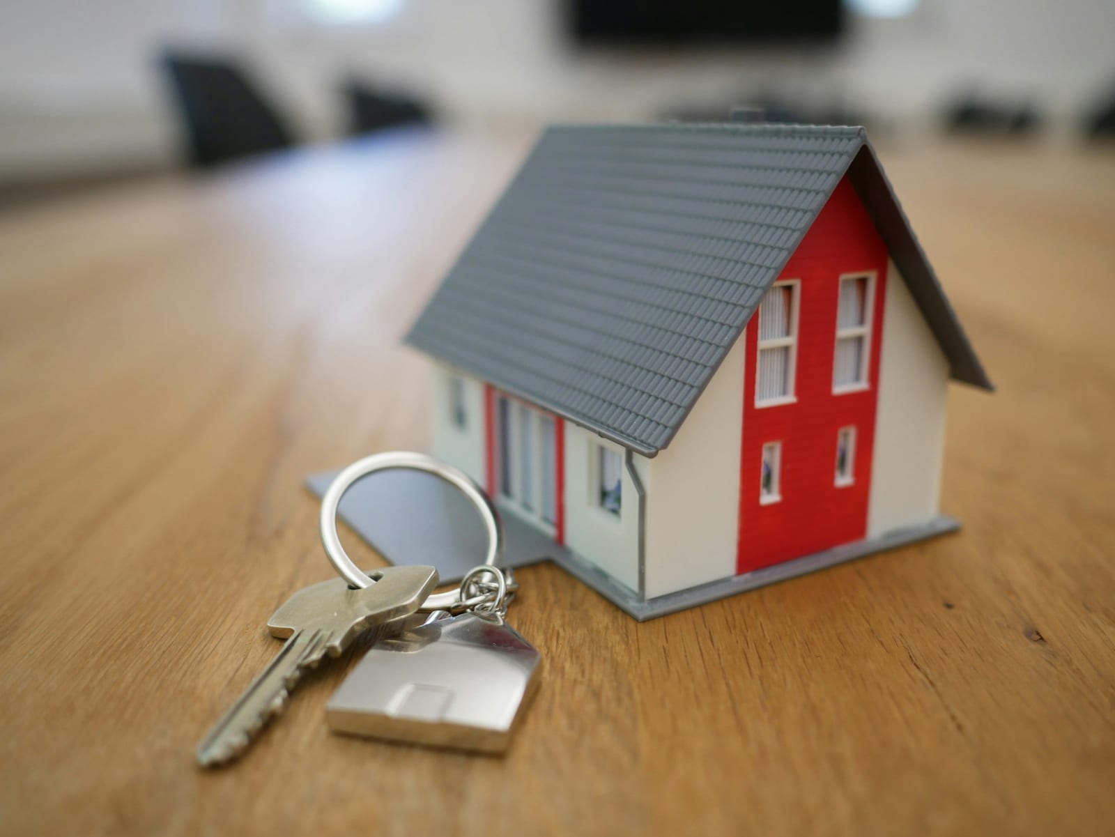 Property manager handing keys to a new tenant.